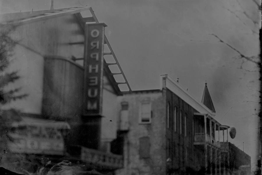 Black and white photograph of the Orpheum Theatre sign in downtown Flagstaff